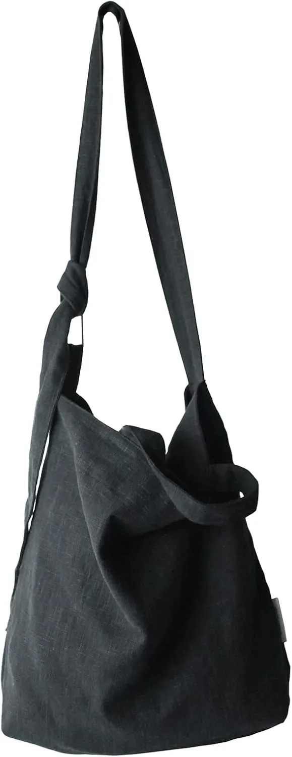 Levait natural hobo bag featuring top handles, an internal zip pocket and an adjustable shoulder strap