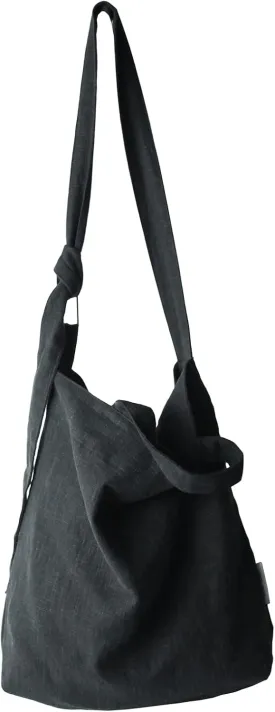 Levait natural hobo bag featuring top handles, an internal zip pocket and an adjustable shoulder strap